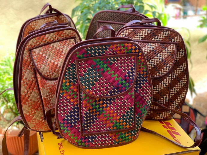 Handwoven pandan backpacks bound for...