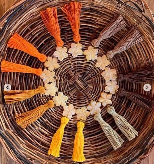 Hand-carved mother of pearl tassel...