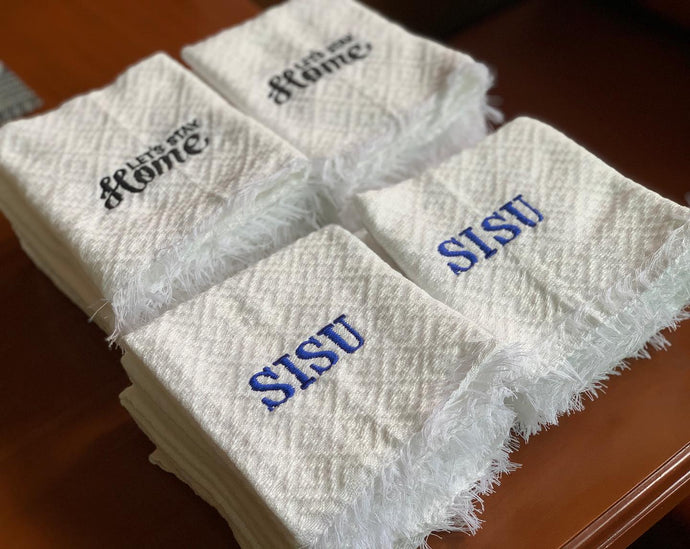 Embroidered Inabel kitchen towels bound...