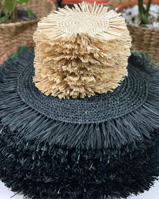 Black raffia placemats and natural...