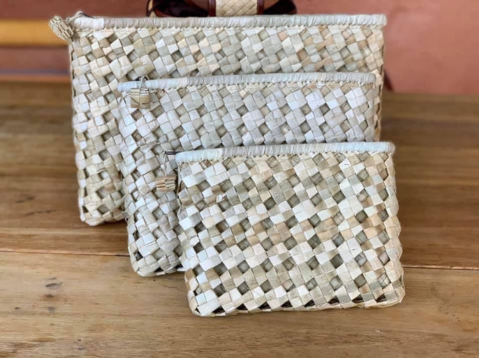 Eyelet pandan clutches #handwovenbagsupplier #pandanbags...