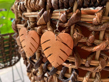 Load image into Gallery viewer, Hand-carved monstera leaf earrings made of mahogany wood
