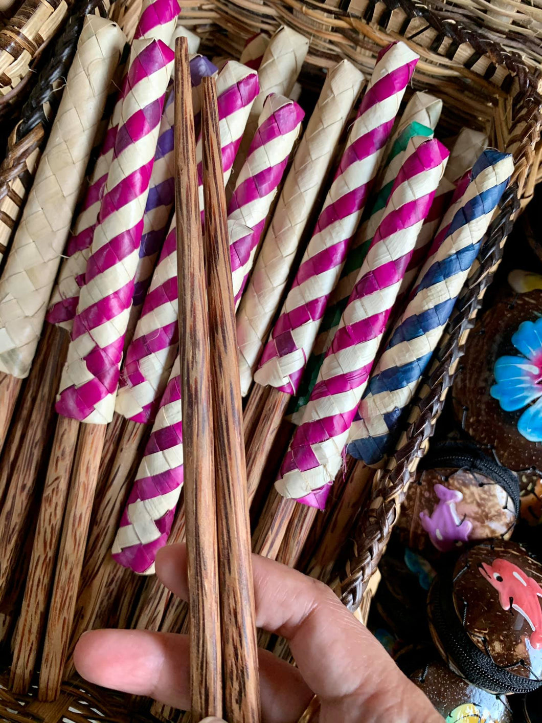 Chopsticks made of coconut wood with buri cover