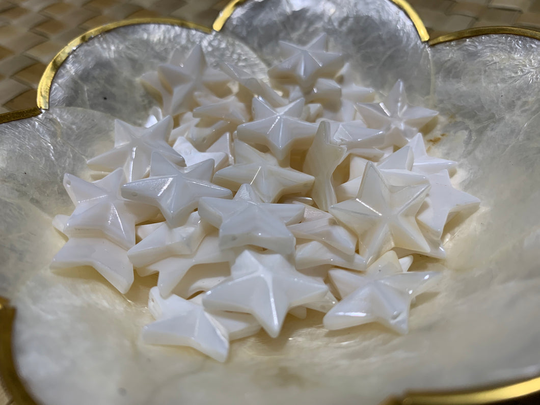 Hand-carved star-shaped river shells charms